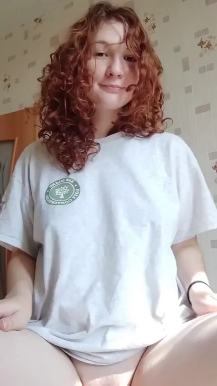 How about a redhead with natural boobs?