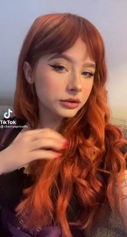 Redhead Catgirl Teases Her Juicy Tits