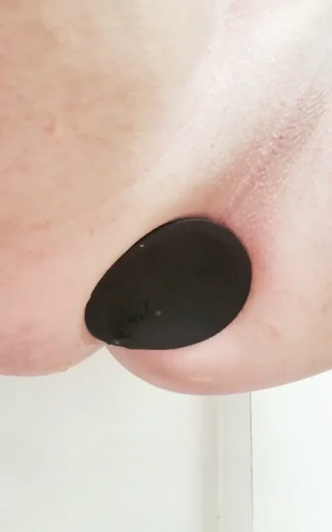 [M]y ass getting massively stretched by this plug. Anyone like? :)
