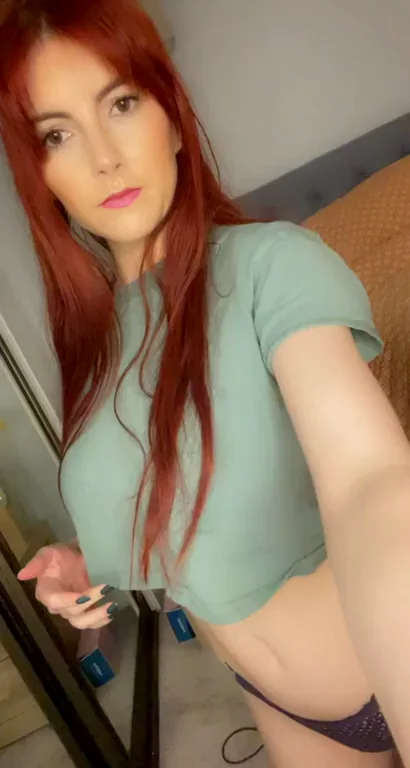 Redhead Tease Hates Herself for These Massive Tits and Curves