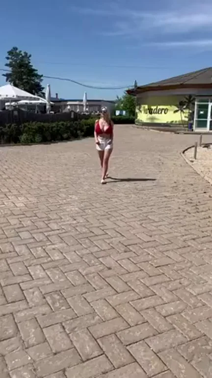 Bouncing tits in red bikini top