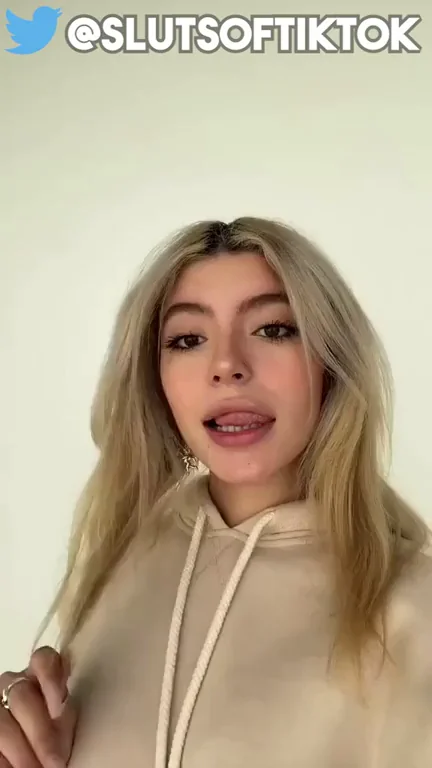 Blonde TikTok Slut Teases with Tongue in Cozy Hoodie