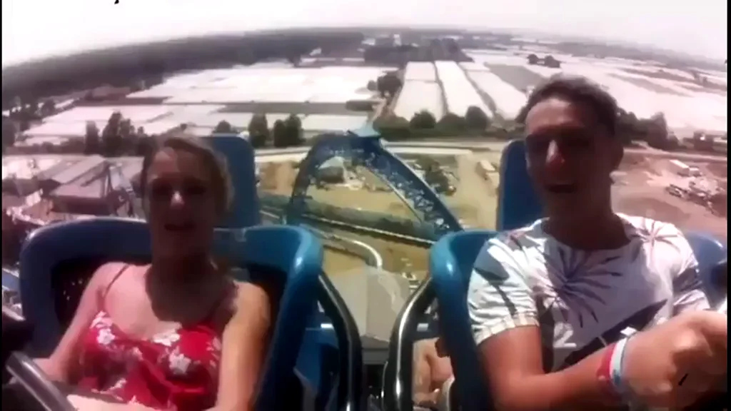 Hot Babe's Top Pops Off on Wild Rollercoaster Ride