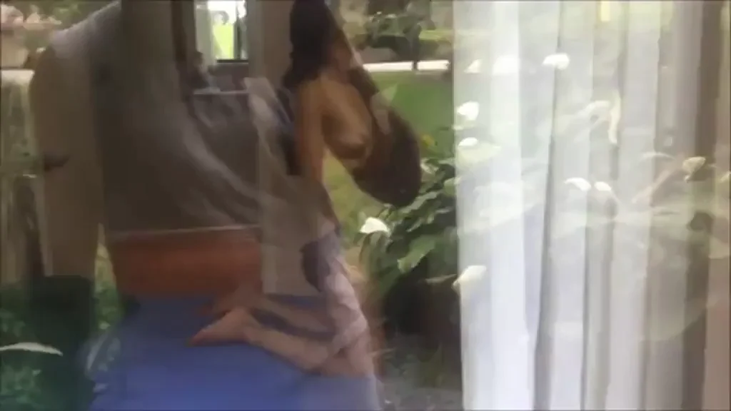 hubby locked out on balcony watching his wife getting satisfied.