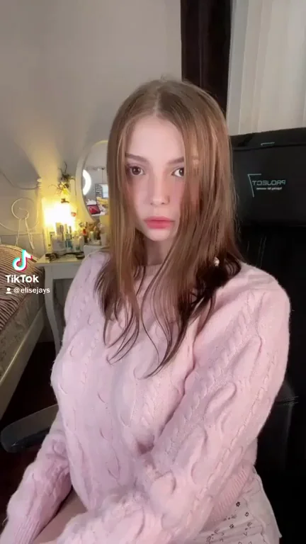 Cute TikThot Blonde's Massive Tits Tease in Pink Sweater