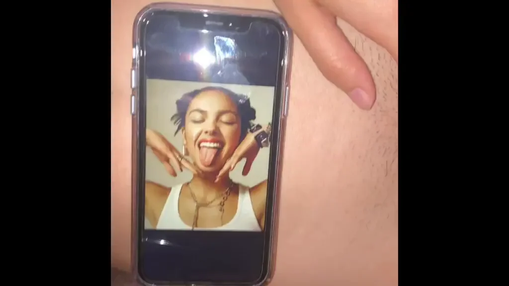 My girlfriend cucks for Olivia Rodrigo. Watch me shoot a load over her while looking at Olivia