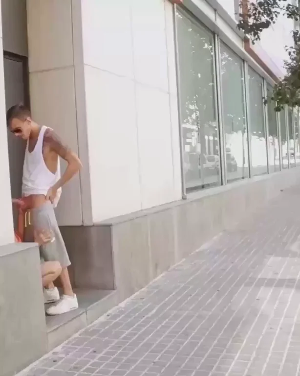 Sidewalk blowjob