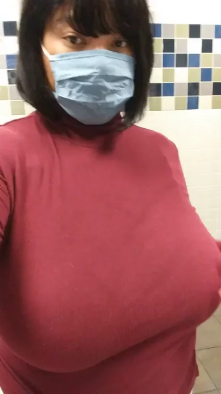 Flashing my huge tits in the restroom ?