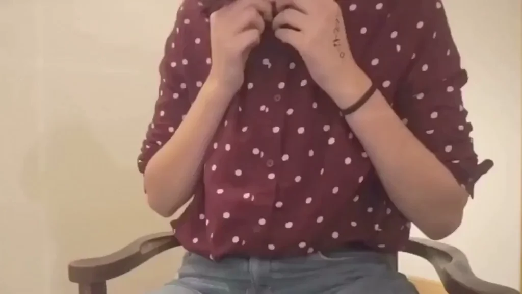 Red Shirt w/ White Polka Dots, Oiled Tits. Who is she?