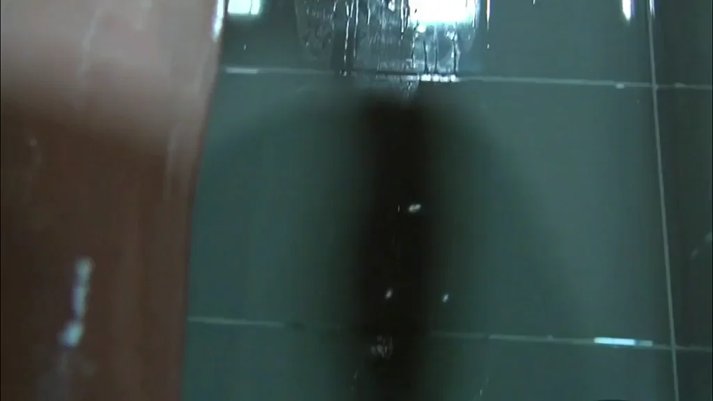 Taking "oilporn" to a new level, she's positively drenched