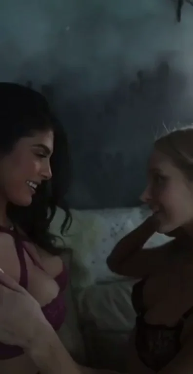 Girls Kissing in Bed