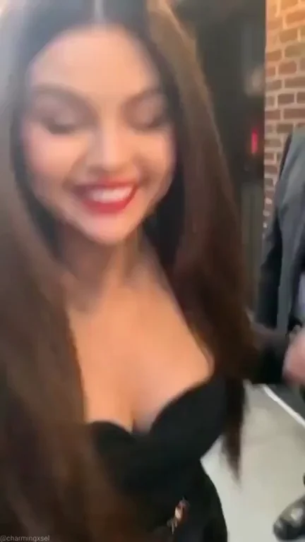 Selena Gomez's Juicy Cleavage Tease in Tight Black Dress 😍🍒