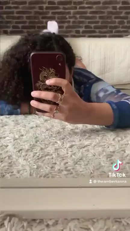 Heart-Shaped Booty Tease: Curly-Haired Amateur's Juicy Ass Reveal