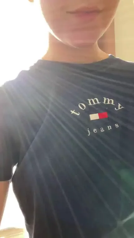 Risking to get seen in front of the window just to show you my sunkissed body?