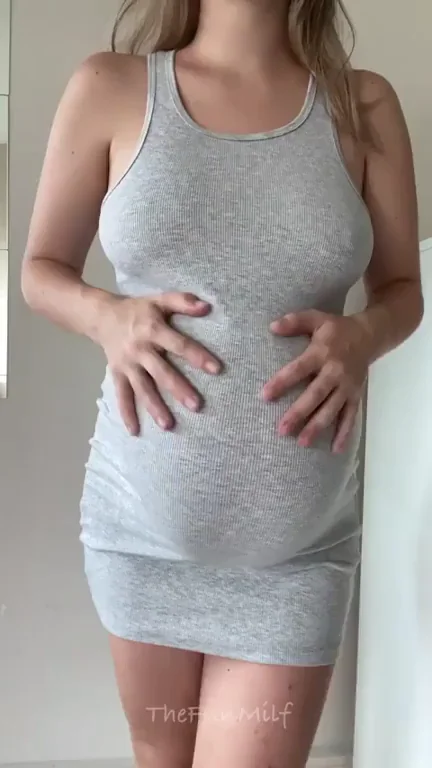 Snap Your Fingers and Watch This Pregnant MILF Strip Bare