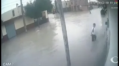 3 men electrocuted in succession after touching metal pole in a flooded street