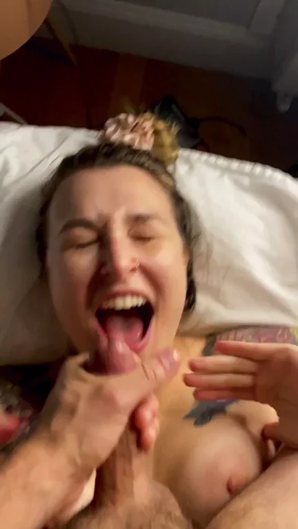 Cum-Drenched Slut Grins Wide with Load on Her Tongue