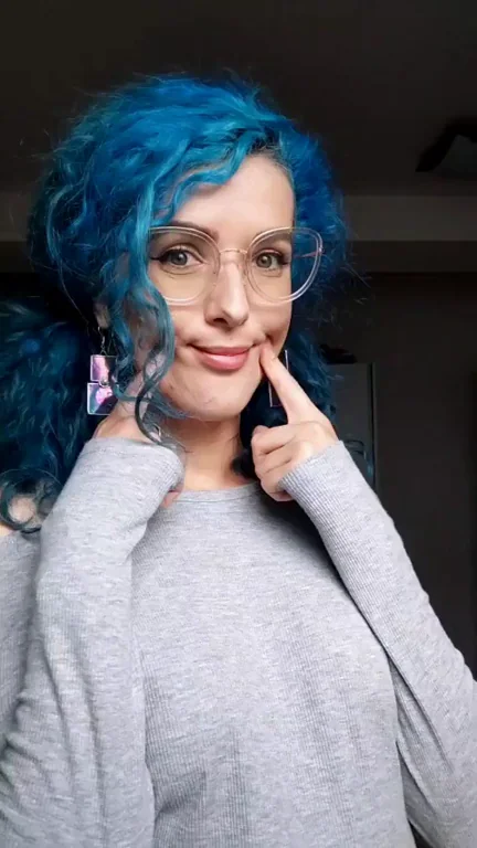Blue-Haired Babe Teases in Her Tight New Top