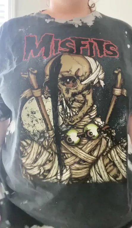 Baggy band t-shirts leave so much curiosity.. surprise!