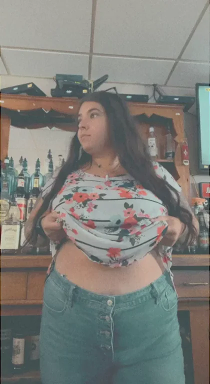 Flashing and playing with my tits between customers has me so fucking horny
