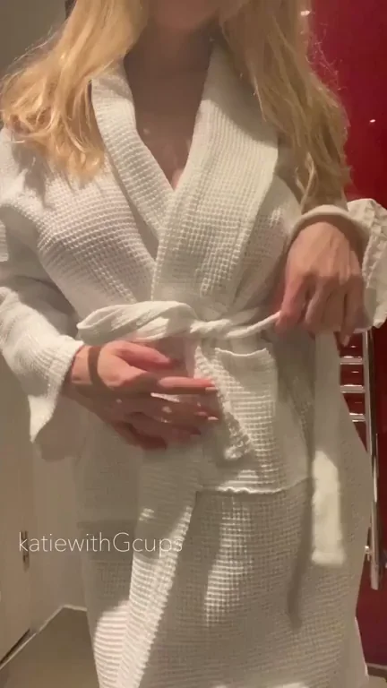 From bathing robe to naked busty blonde!