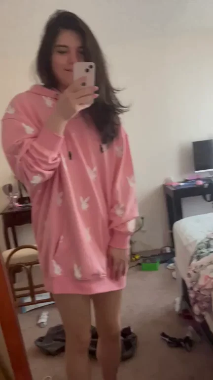 Cozy Hoodie Tease: Trans Cutie Flashes Thick Cock Under Pink Sweatshirt