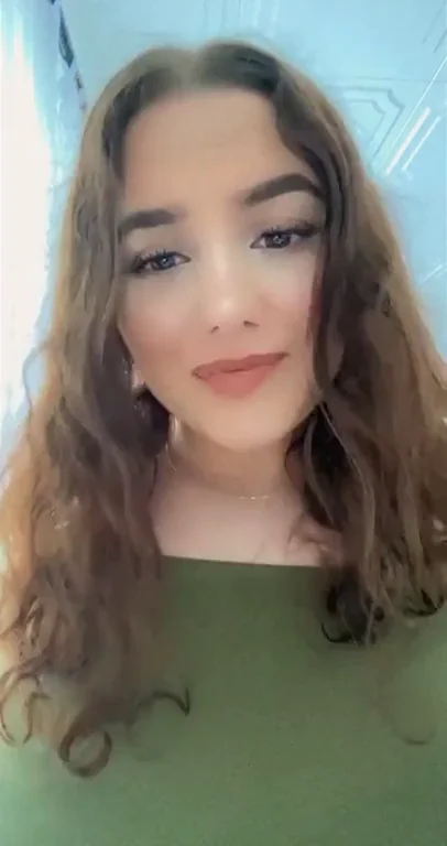 Busty Persian in Tight Green Top