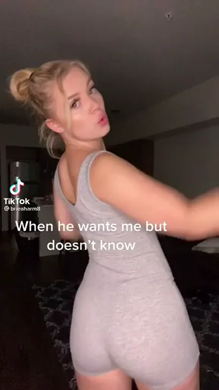 TikTok Tease: Blonde Bombshell's Moody Ass Shake & Pout