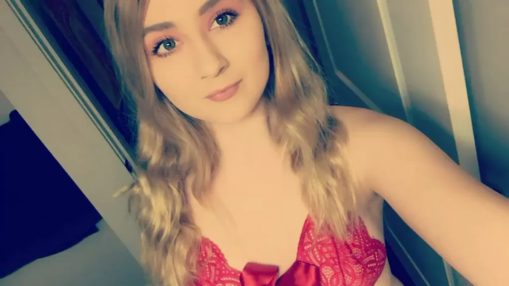 Red Slutwear Tease: Does This Make My Tits & Ass Pop?