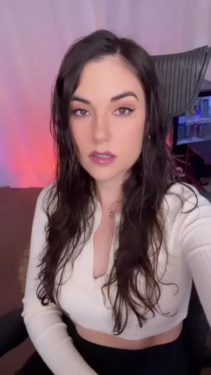 Sasha Grey's Sultry Lip Primer Tease in Cleavage-Baring Crop Top