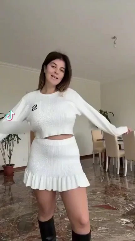 Busty Bombshell's Slutty White Skirt Tease!