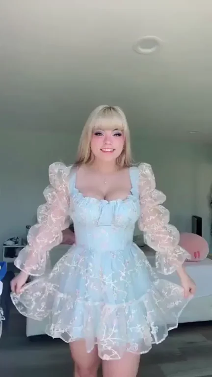 Very cute woman in a blue dress