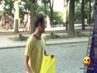 Dude's Bright Yellow Umbrella Tease in the Park