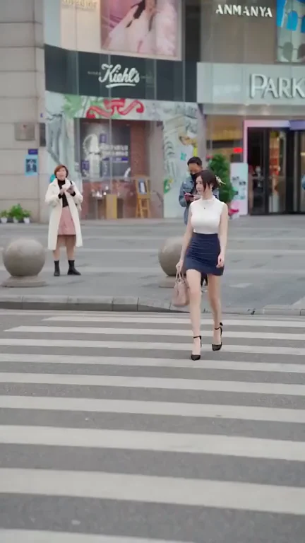 Tight top, skirt and heels