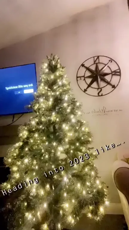 🍒 Busty Babe's Tits Spilling Out Her Pink Bra by the Christmas Tree 🔥