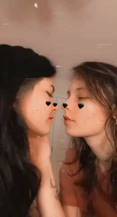 Heart-Filtered Slutty Lip Lock: Two Babes Sucking Face