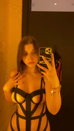 Slutty Changing Room Tease in Strappy Black Bodysuit