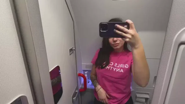 Horny Airplane Slut Flashes Perky Tits in Tiny Lavatory Tease