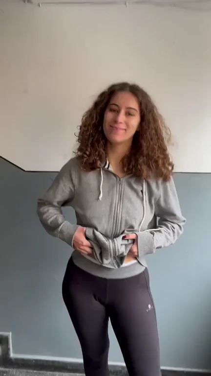 Curly-Haired Hottie Teases Hot Neighbor with Slutty Christmas Hoodie Reveal
