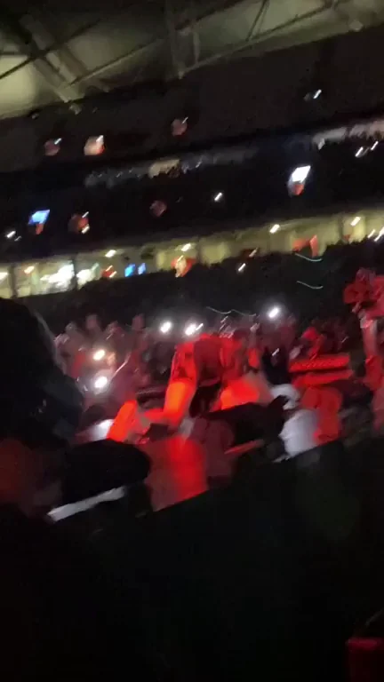 On her knees from behind