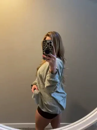 Baggy Shirt Tease: Redhead's Juicy Ass Surprise Underneath 😈🍑