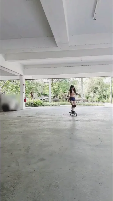 Asian Skate Slut Flashes Perky Tits in Public Garage