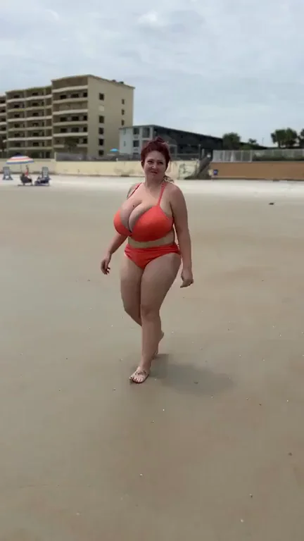 Overflowing Her Huge Bikini