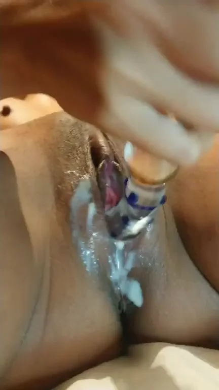 Asian wife tasting herself