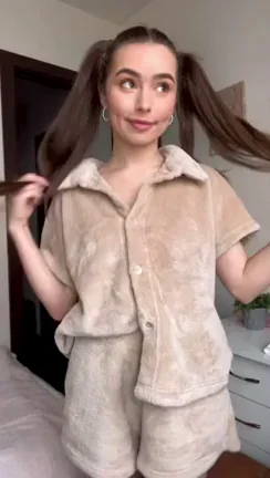 Pigtail Tease Unleashes Her Perky Natural Jugs