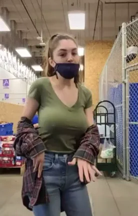 Busty Babe's Massive Tits Tease in Pet Store