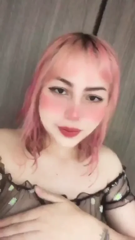 Pink-Haired Slut Teases Her Juicy Cleavage