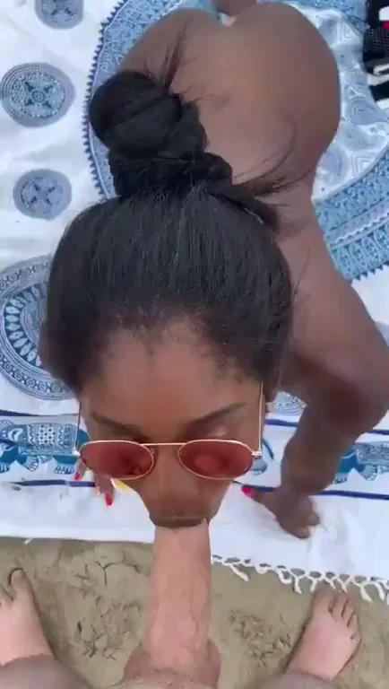 Hot Ebony Babe Slurps White Cock on Busy Beach