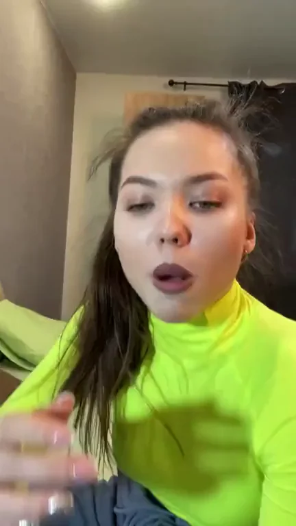 Mystery Neon Slut's Lip-Licking Tease in Lime Green Bodysuit