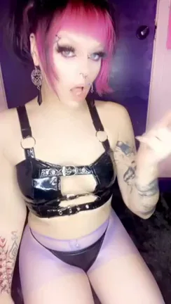 Brain-Melting Domme: Pink-Haired Goddess in Shiny Harness Teases Her Slutty Curves
